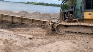 Pushing in the Dry Sand Boat Ramp Base Layer