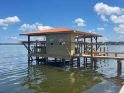Henderson Custom Entertainment Boathouse Near Lake Livingston