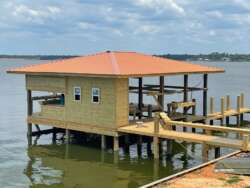 Henderson Custom Entertainment Boathouse Near Lake Livingston