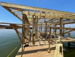 Boathouse on Lake Livingston with a bar and entertainment system