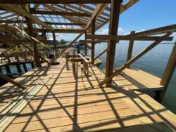 Boathouse on Lake Livingston with a bar and entertainment system