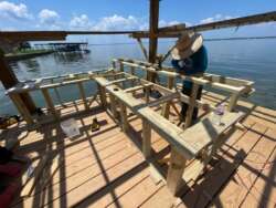 Boathouse on Lake Livingston with a bar and entertainment system